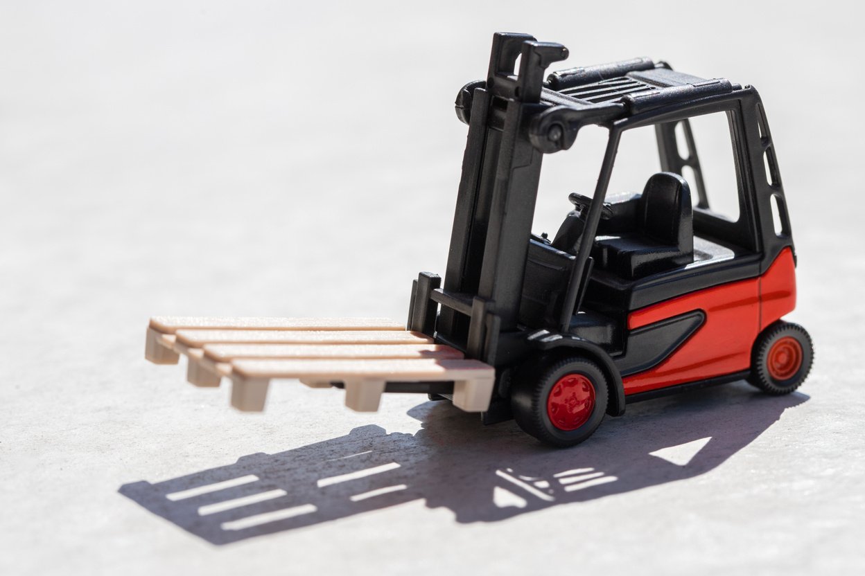 fork-lift truck miniature concept background